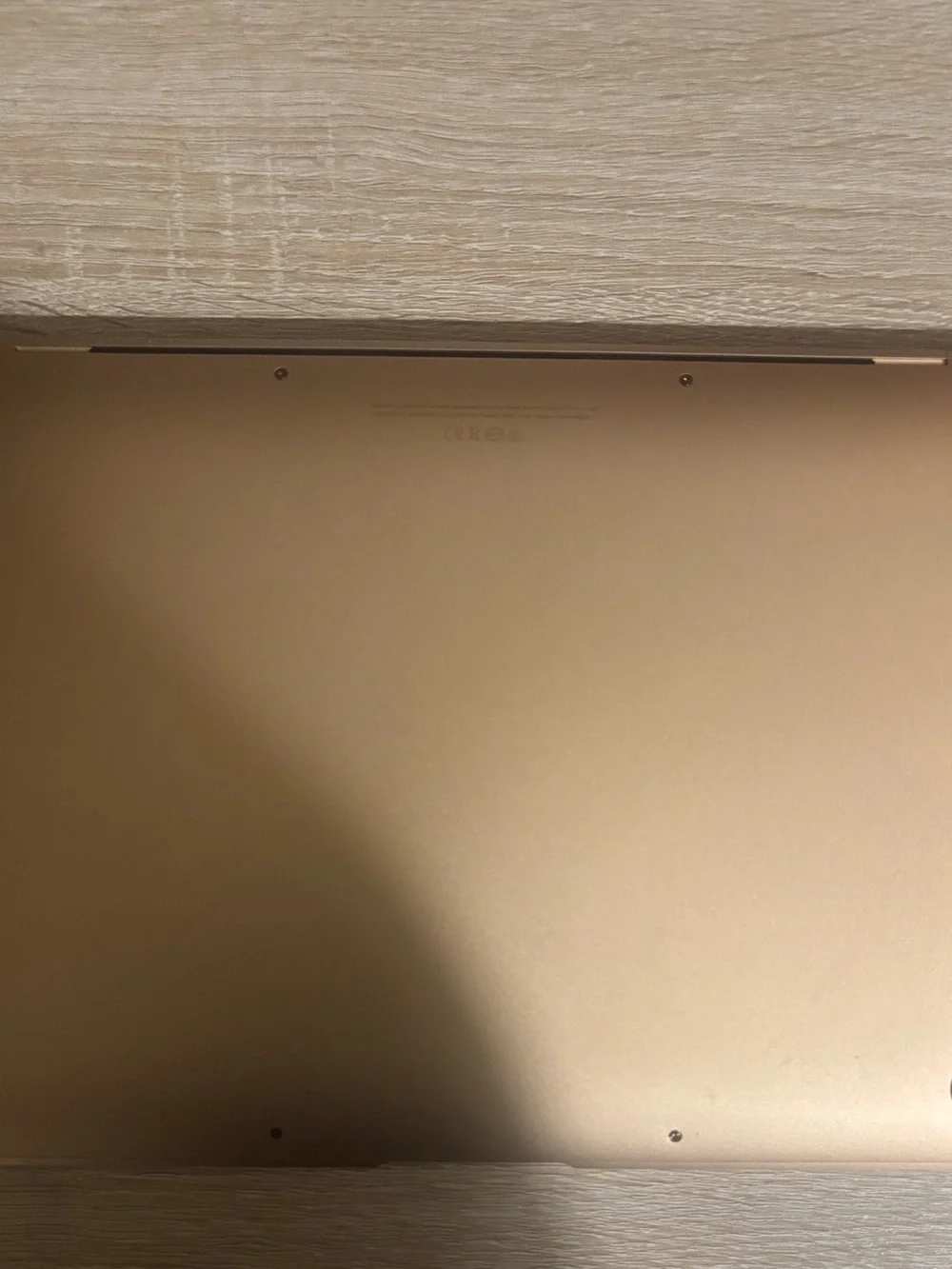Apple Gold Laptop with Black Apple Logo